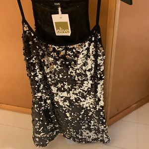 NWT size medium black sequin camisole top perfect fit any holiday.